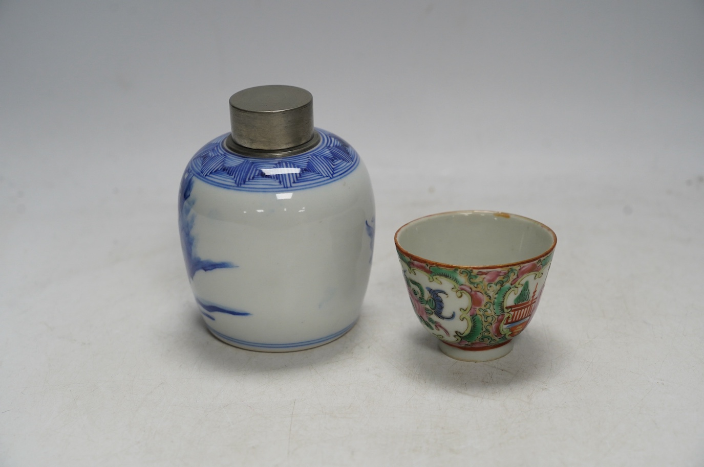 A pewter topped Chinese blue and white tea caddy together with a famille rose teabowl. Condition - good